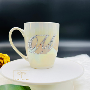 Mother of pearl colored mug with rhinestones